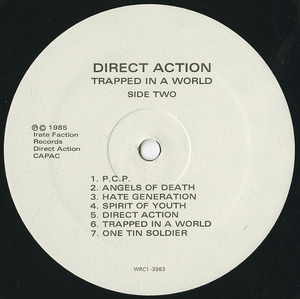 Direct action trapped in a world label 02