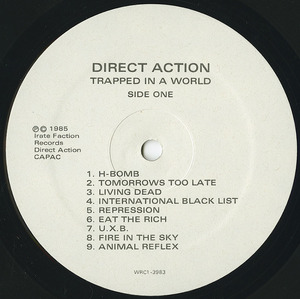 Direct action trapped in a world label 01
