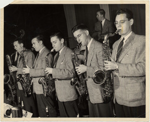 The johnny holmes orchestra on stage at victoria hall