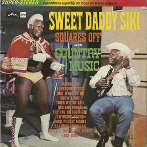 Sweet daddy siki squares off with country music front