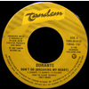  Don't Go (Breaking My Heart) b/w All That Magic