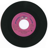 Takes My Breath Away b/w Roll Your Love Along