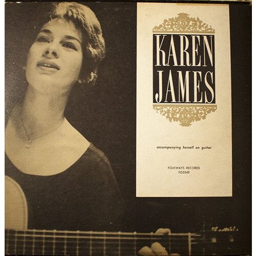 Accompanying Herself on Guitar