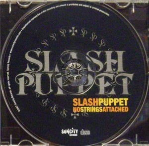 Slash puppet   no strings attached   disc