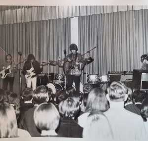 The paupers with brad campbell on bass.
